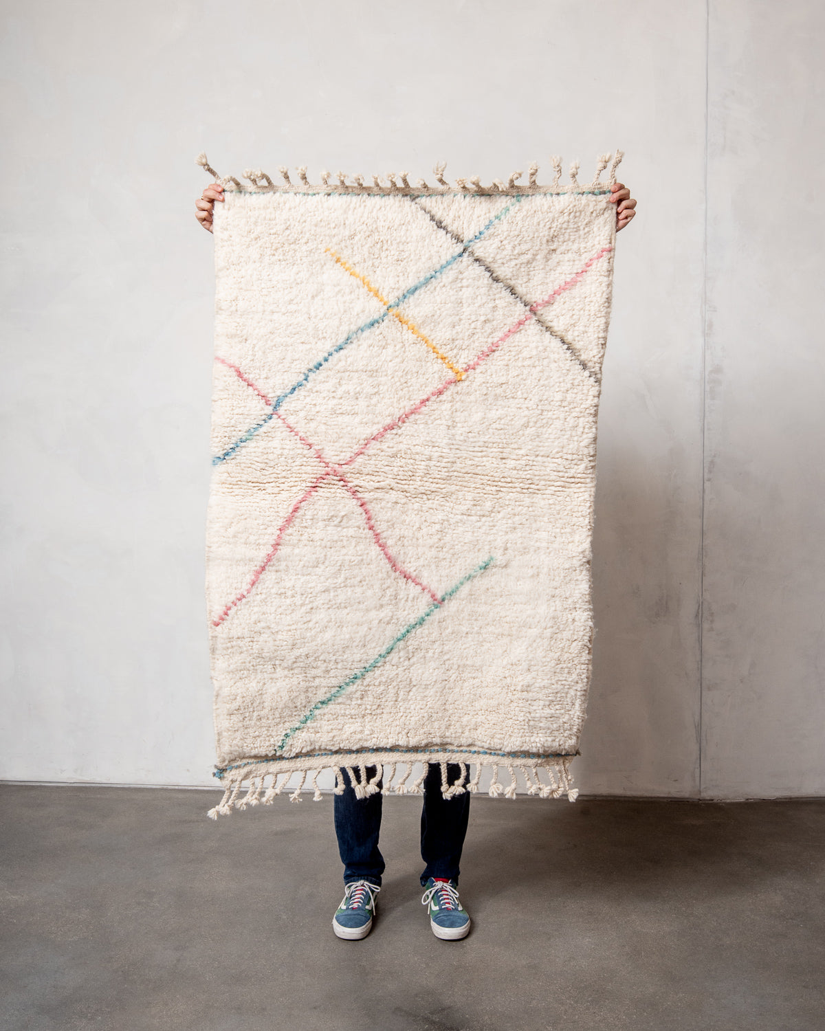 Modern, designer, handcrafted Berber rug from Morocco. Beniourain carpet with beautiful colours and patterns and fluffy wool texture.